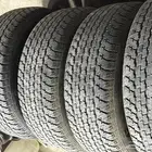 أربع كفرات دعسة برجستون شبه الجديد مقاس 16-70-275