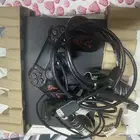 بلايستيشن 4 مع ذراعين بحاله الزيرو