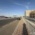 للبيع ارض تجارية سكنية على طريق الهجرة