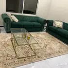 كنب مع سجاده وطاولات