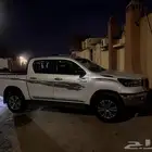 هايلوكس 2023 دبل بنزين فل كامل ممشى 50 الف فقط