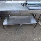 طاولات ستيل و عجانة ومكينة تغليف