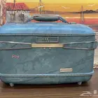 شنطة مكياج فيروزي