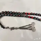 سبحة يسر مطعمة فضة ومرجان احمر