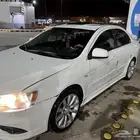 سيارة متسوبيشي لانسر فل كامل