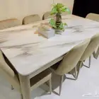 طاولة طعام رخامية مع 8 كراسي   تصميم أنيق وفخم