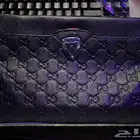 شنطة قوتشي رجالي اصلية 100   100
