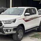 هايلوكس غمارتين GLX -S بريمي فل كامل دبل بنزين تمتيك 2025