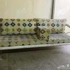 كرسي حديد . مظلة . مكينة خياطة