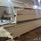 صيانة وبرمجة ماكينة لصق شريط scm olimpic k400