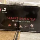 ميكرويف LG جديد مفتوح الكرتون