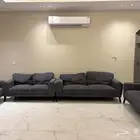 كنب هوم سنتر قطعتين ثلاثي وقطعتين ثنائي اللون حجري على كحلي