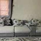 كنب تسع قطع مع طاولة