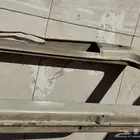 قطع غيار . قاعدة زجاج اماميه جيب ربع 84