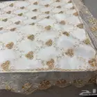 ستاره ومفرش طاوله ولباس خداديات