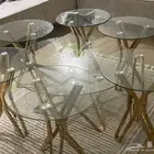 طاولات زجاج وأستيل ذهبي
