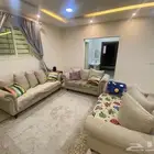 كنب مع طاولات خدمة