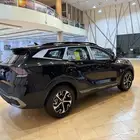 كيا سبورتاح لارج 2025 اسود من الداخل اوف وايت