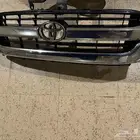 للبيع شبك هايلوكس أصلي فيه قواعد مكسوره