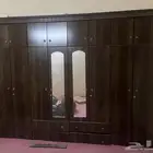 دواليب وغرفة نوم ودفاية ومكينة خياطه واشرطه وكرسي متحرك
