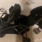 عربة أطفال تؤام بحالة جيده