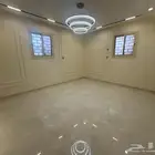 شقه ارضيه للبيع حي اليرموك مساحه كبيره