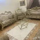 كنب مع ستاره وطاوله كبيره واربع طاولات صغار
