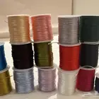 مجموعه 15 لون خيوط ساتان 1 5mm طول 100 متر غير مستخدمه