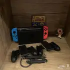 نينتيندو سويتش 1 جديد مع جميع ملحقاته ولعبة سوبر ماريو 2
