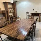 طاولة طعام 5 قطع مع 10 كراسي وتحف