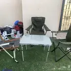 كراسي رحلات وطاولة من الرماية