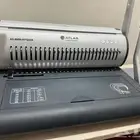 آلة تخريم سلك كتب ومذكرات