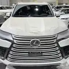 لكزس BB LX 600 بريمي 2025 اللون ابيض داخلي احمر نظام 50-50