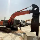بوكلين هيتاشي مع مقص حديد