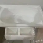 طاولة غيار وإستحمام الطفل