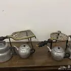 ملقمة قهوة امريكي وبراد انقليزي ومركب نار