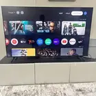 شاشه TCL 65بالطاوله الحامله للتلفزيون