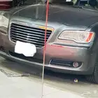 صدام امامي كريسلر 2011 مع شبك و كشافات