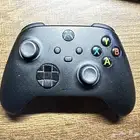جهاز Xbox series X and controller
