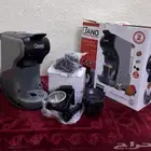 مكينة قهوة مع كامل م لحقاتها