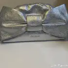 شنطة كلتش من تيد بيكر لون فضي Ted baker للمناسبات