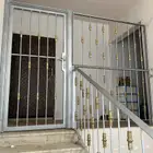 باب مع شبك حاجز حديد للبيع