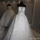 تفصيم وتصميم فساتين العروسه على حسب الطلب