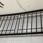 سرير حديد بقواعد خشب
