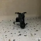 سكوتر اسود كهرب معه كل الغراض