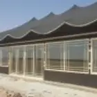 خيام ملكيه مجالس قرميد سندويش بلن مظلات مواقف مظلات مدارس