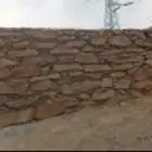 بكلين لقص الارضي وبنيان جدارت حجر وربراب كنبريش لتخريم