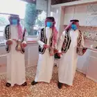 قهوجيين وصبابيين بالزي السعودي الموحد