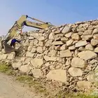 بوكلين لقص الاراضي والحفر والهدم العماير