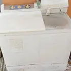 غساله  مكنسه كهربائيه